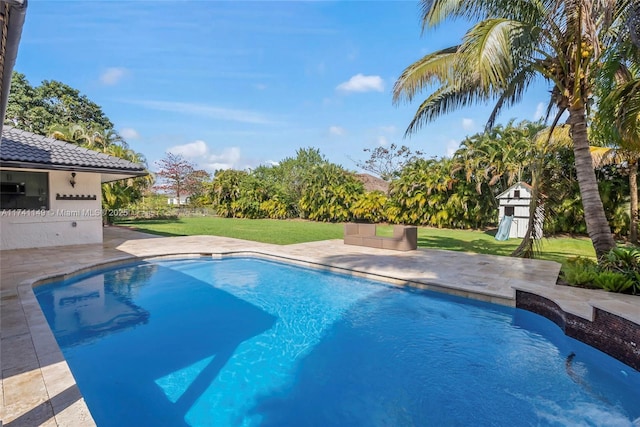 11965 SW 15th Ct, Davie, FL 33325 - outdoor pool with a yard and a patio area