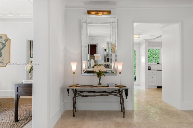 hallway with crown molding