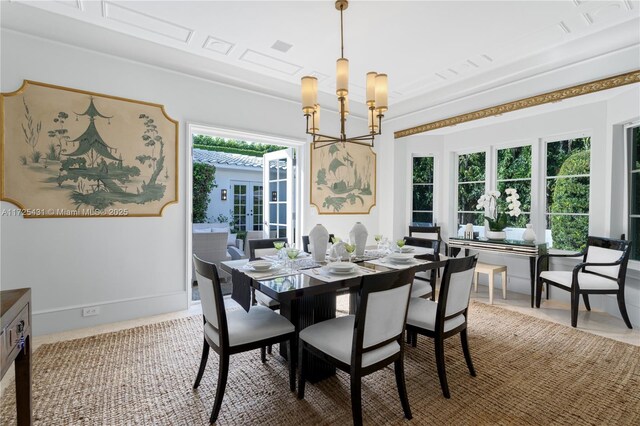 dining space with a notable chandelier