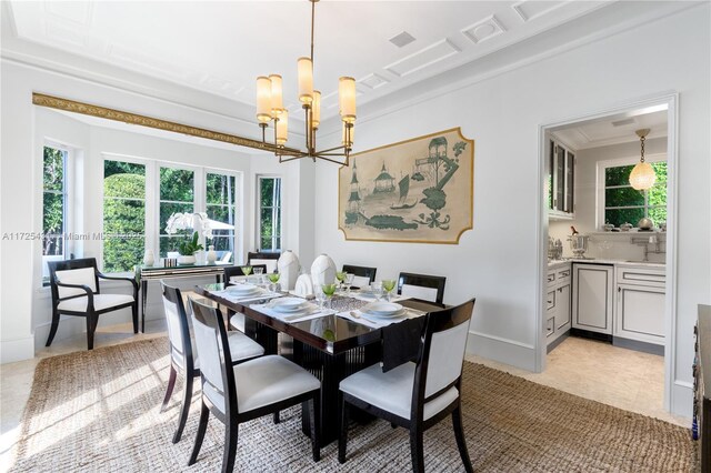 tiled dining space featuring a notable chandelier