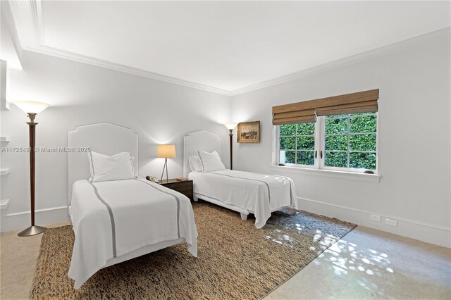 bedroom with ornamental molding