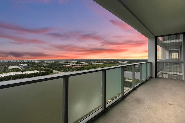 view of balcony at dusk