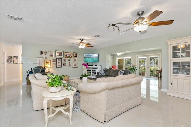 living room featuring a textured ceiling