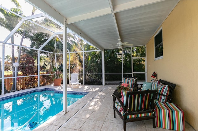 pool with a lanai, an outdoor living space, and a patio