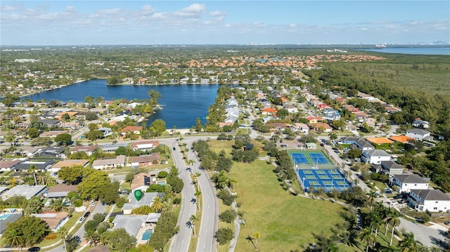 bird's eye view with a water view and a residential view