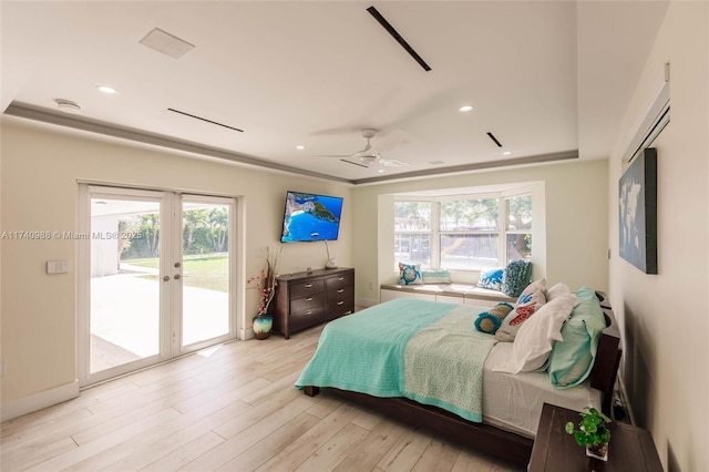 bedroom with french doors, access to outside, ceiling fan, and light hardwood / wood-style flooring