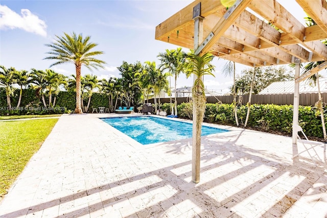 view of swimming pool featuring a patio area