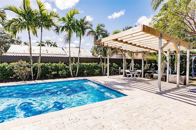 view of pool featuring a pergola and a patio