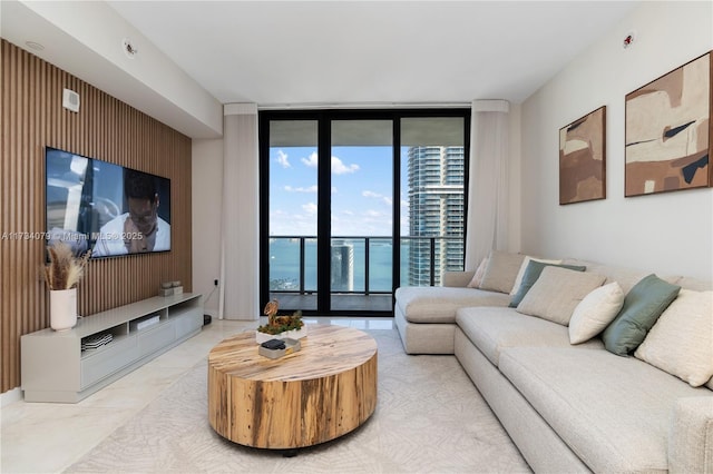 living room featuring floor to ceiling windows