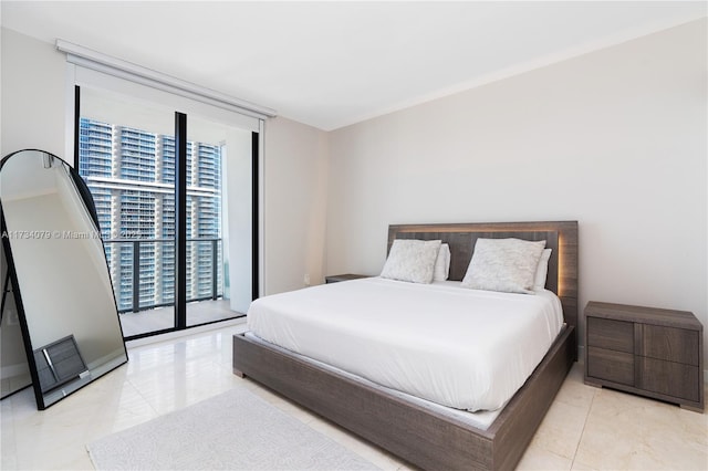 bedroom with access to outside and expansive windows