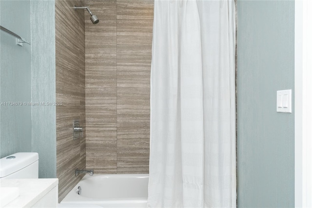 bathroom featuring vanity and shower / bath combo