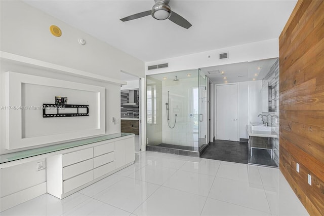 bathroom with ceiling fan, tile patterned floors, vanity, and a shower with door