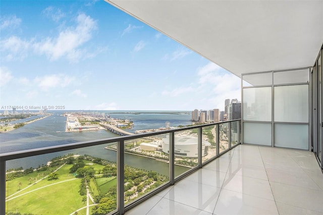 balcony featuring a water view