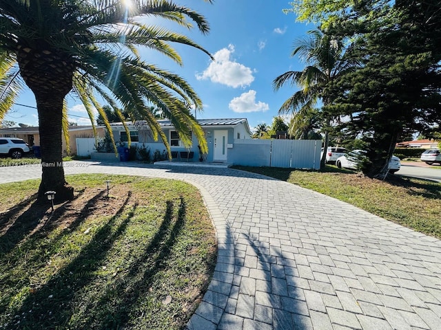 view of front of home with a front yard