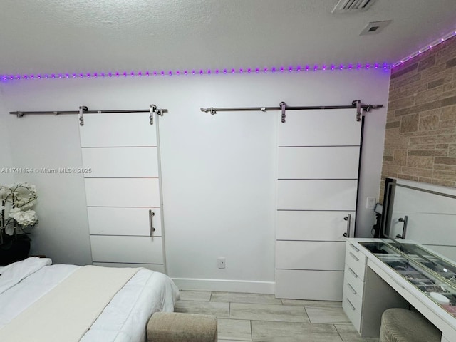 bedroom with a textured ceiling