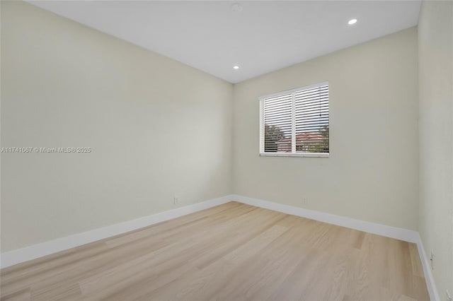 unfurnished room featuring light wood-type flooring