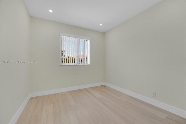 unfurnished room featuring light hardwood / wood-style flooring