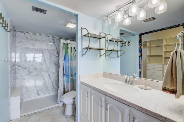 full bathroom with vanity, shower / tub combo, and toilet