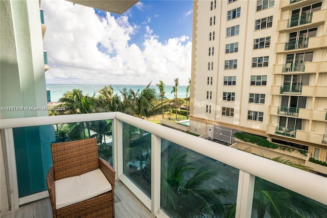 balcony featuring a water view