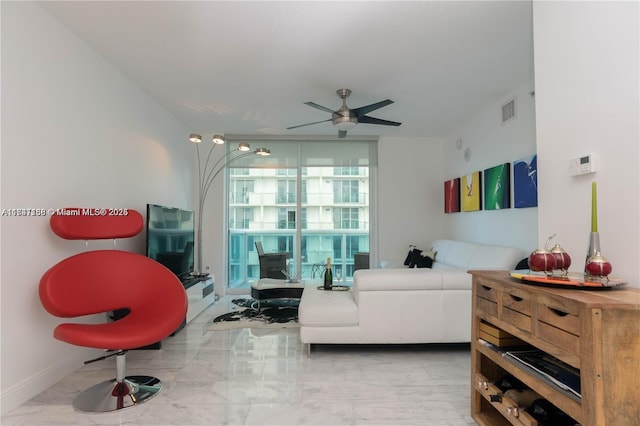 living room featuring ceiling fan