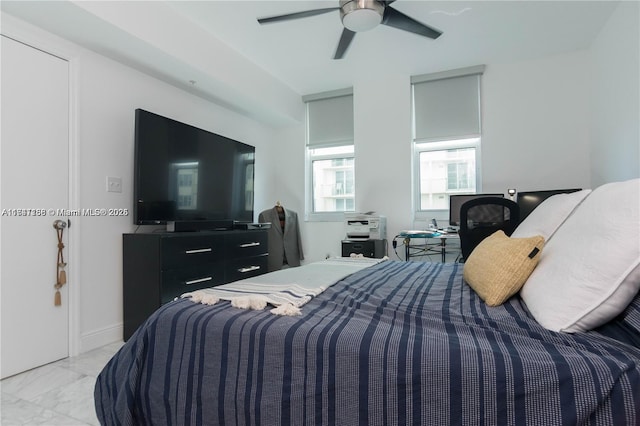 bedroom featuring ceiling fan