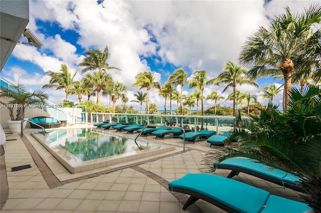 view of pool featuring a patio