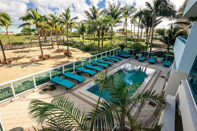 view of swimming pool with a patio