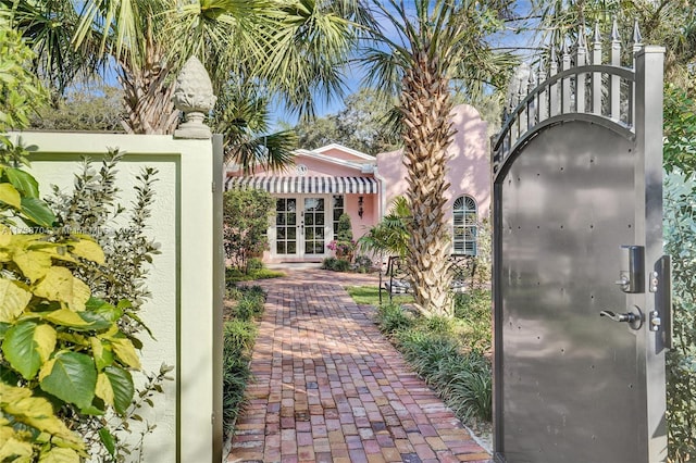 view of gate with french doors