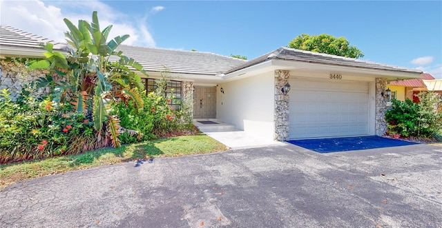 view of front of home featuring a garage