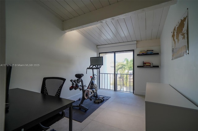 workout area with wooden ceiling, vaulted ceiling, and light tile patterned floors