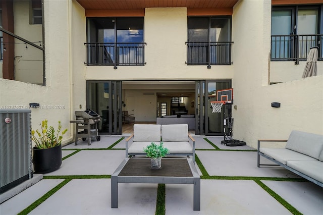 view of patio / terrace featuring cooling unit, grilling area, and outdoor lounge area