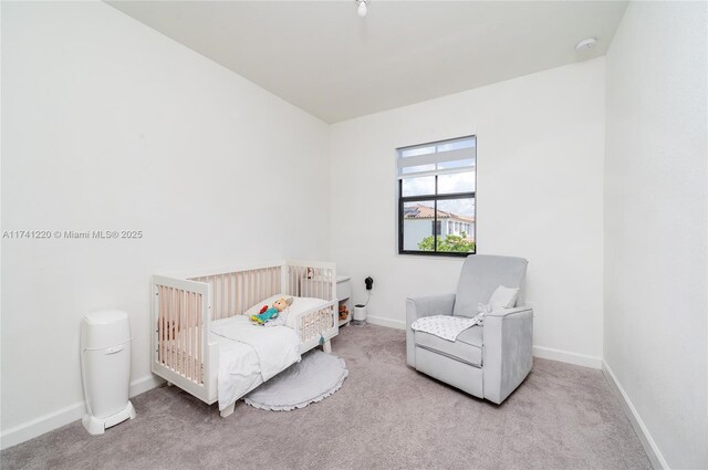 bedroom with light carpet