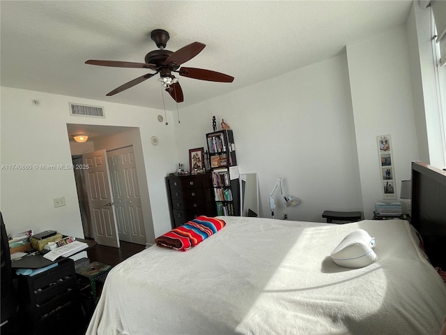 bedroom with a closet and ceiling fan