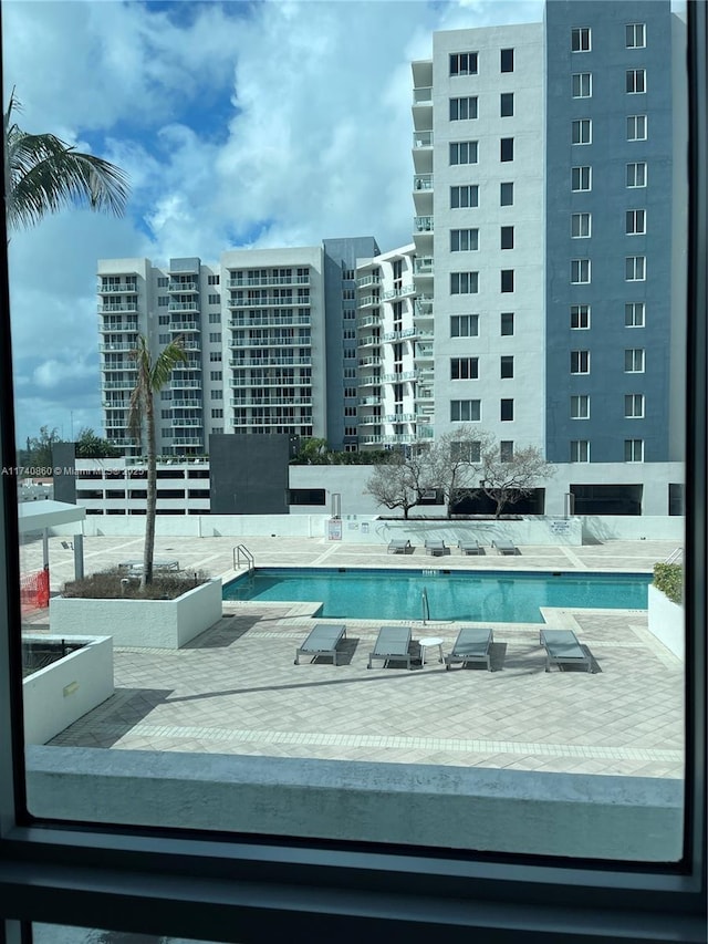 view of pool with a patio