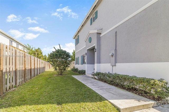 view of yard with fence