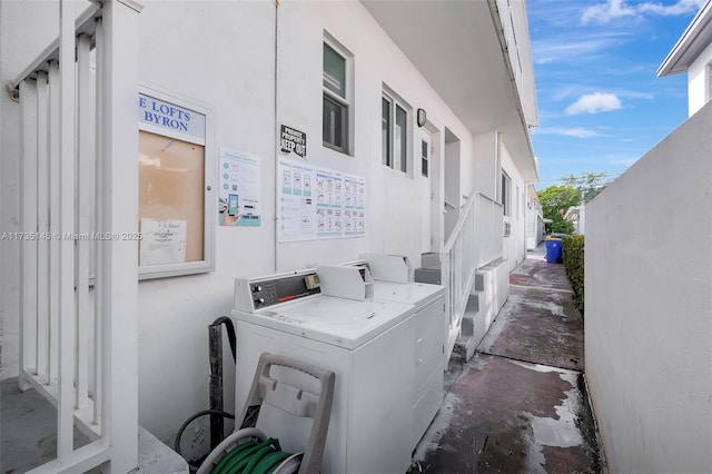 laundry room with separate washer and dryer