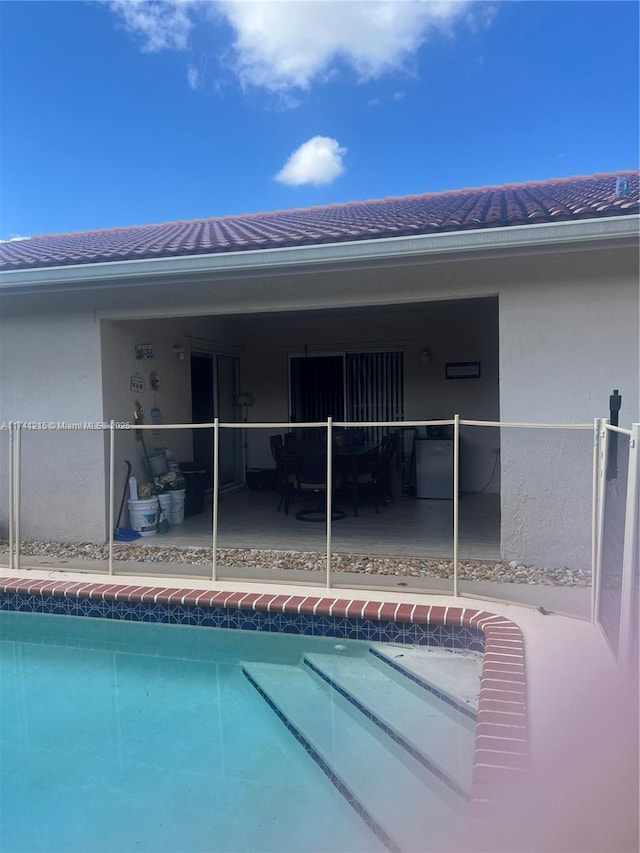 view of pool featuring a patio