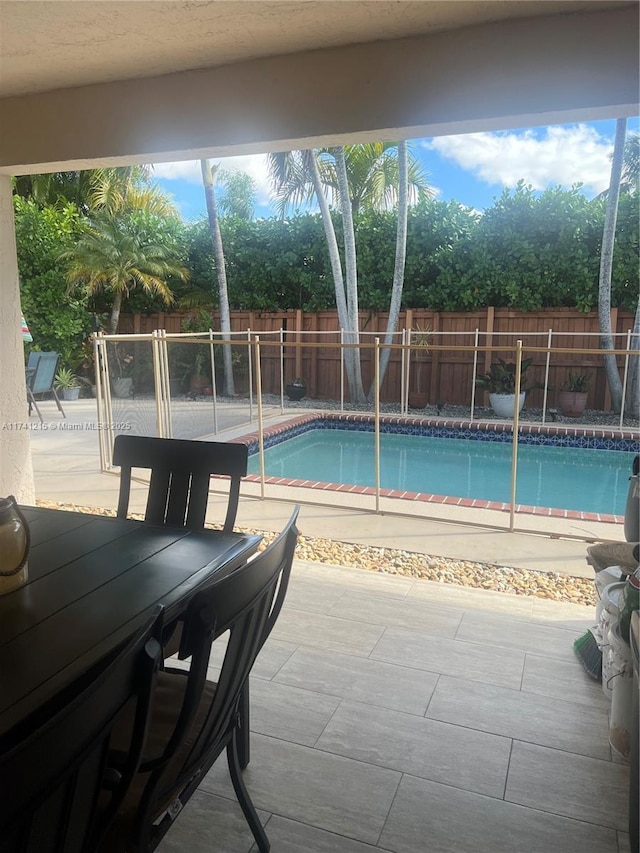 view of pool featuring a patio area