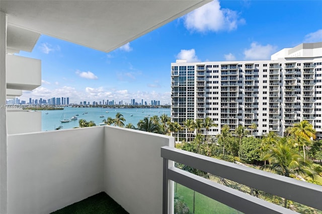 balcony with a city view and a water view