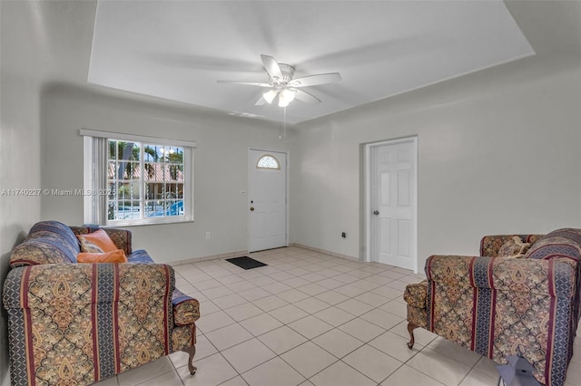 interior space with ceiling fan