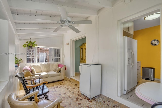 sunroom with vaulted ceiling with beams and ceiling fan