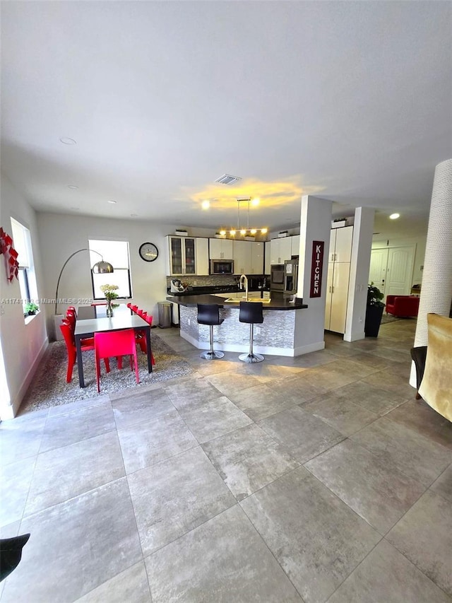 kitchen featuring a breakfast bar area