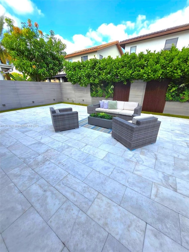 view of patio / terrace with an outdoor hangout area