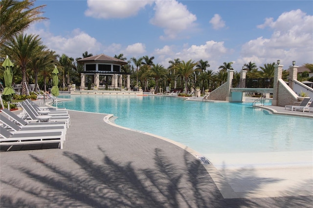 view of pool with a gazebo and a patio