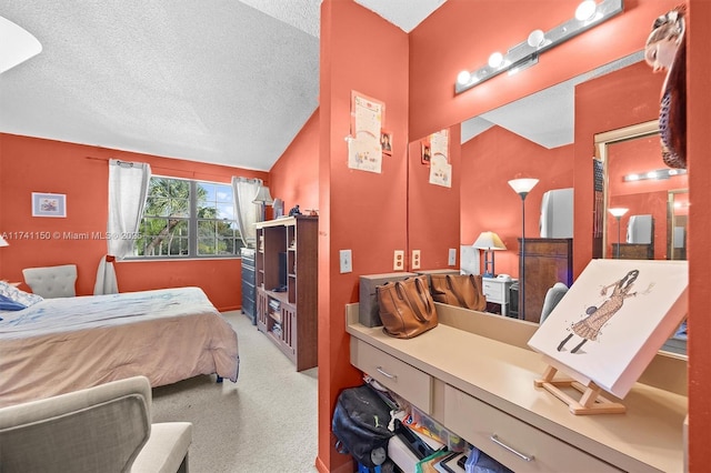 carpeted bedroom with a textured ceiling