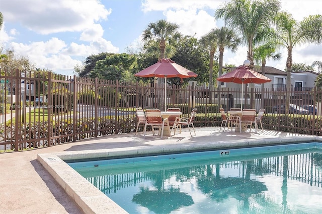 view of pool with a patio