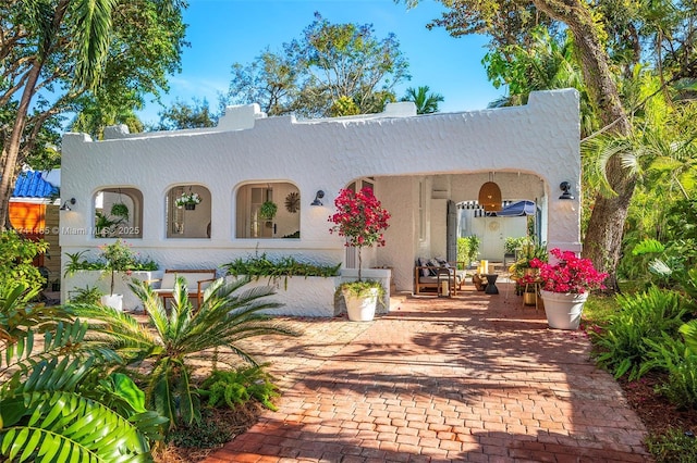 view of front of house featuring a patio area