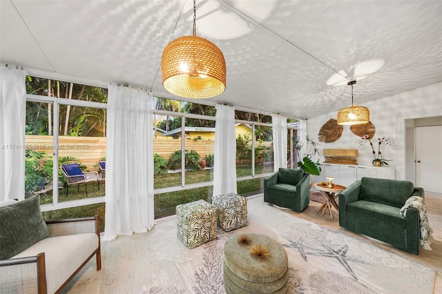 sunroom with lofted ceiling