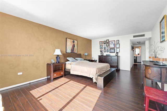 bedroom featuring wood-type flooring