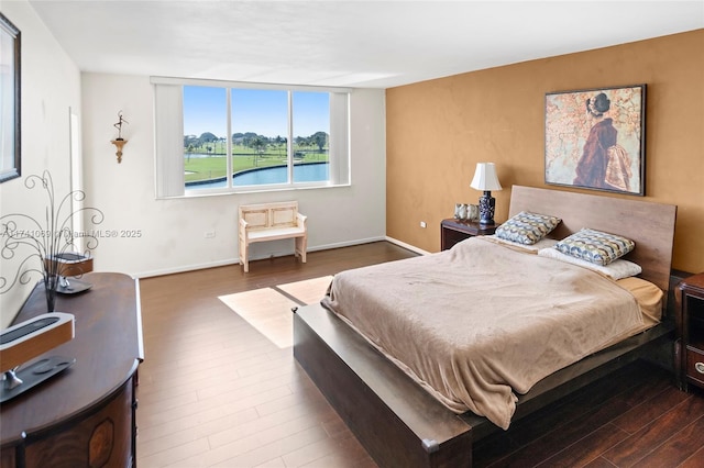 bedroom featuring dark hardwood / wood-style floors